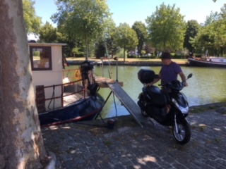 And off comes the scooter for the first time - Cambrai